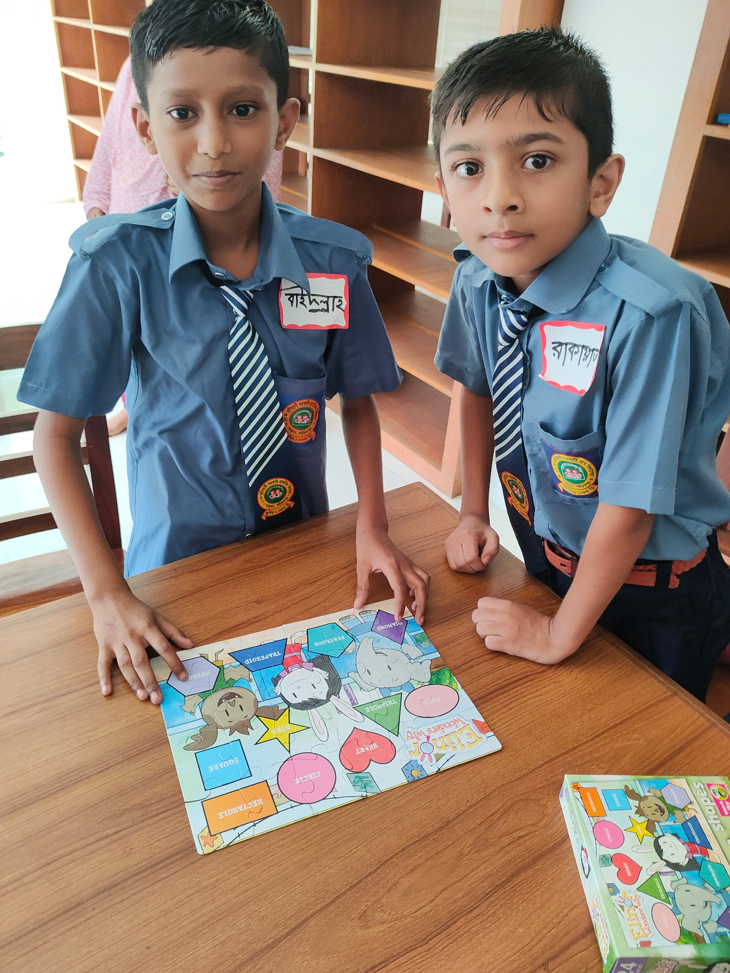 Shapes & vocabulary activity — primary school students learning through play.
