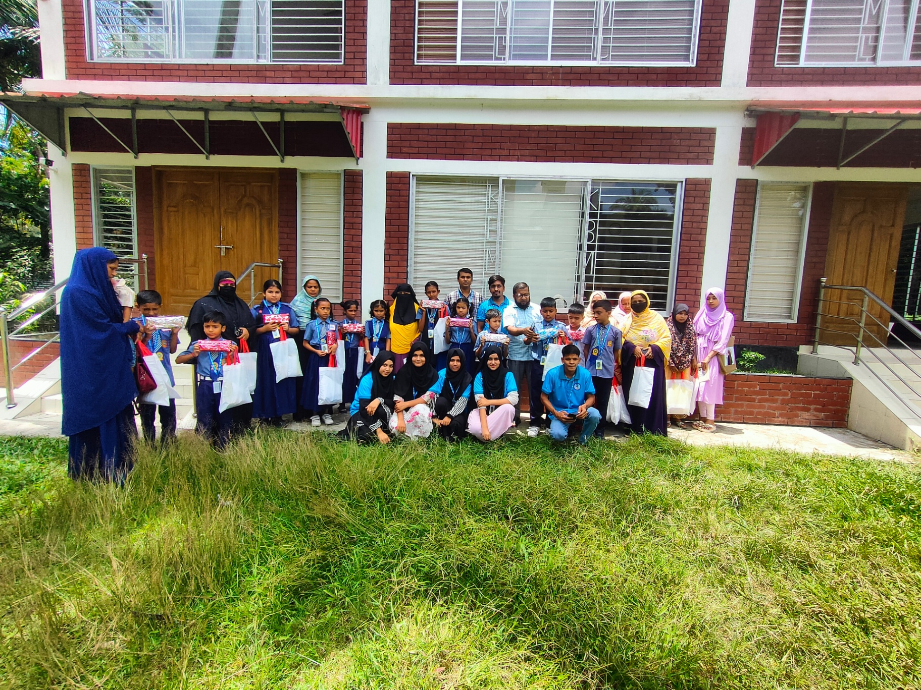 Participants and guardians at the KBML library building, Kaneshwar.